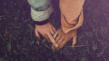 Couple holding hands